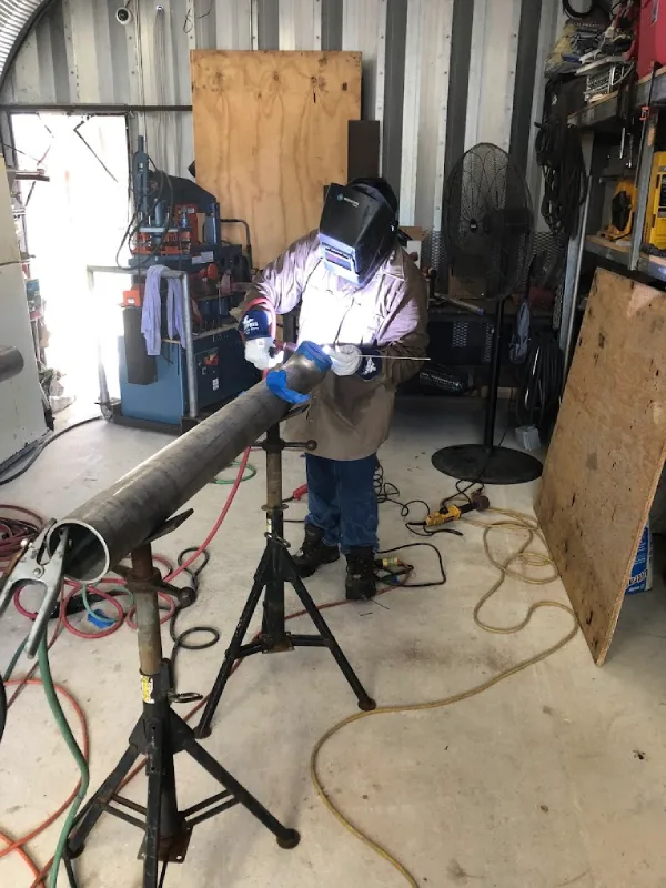 Shop welding on a steel pipe section